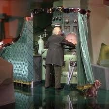 The dog pulls back the curtain.